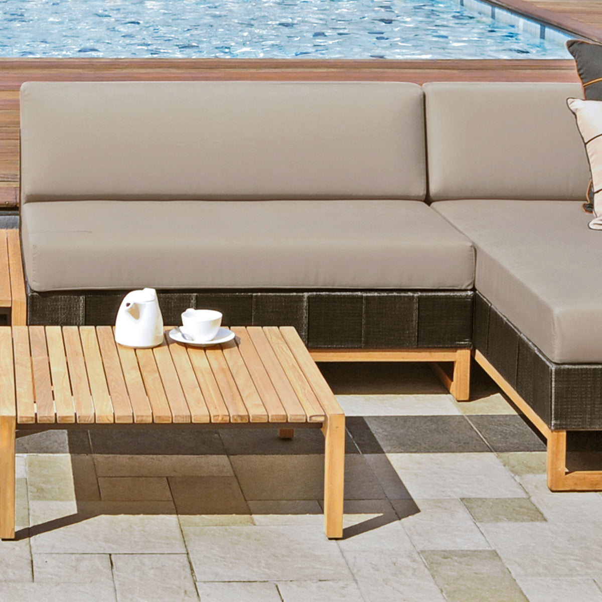 Ekka Sectional Seat by Mamagreen, showing ekka sectional seat with coffee table in live shot.