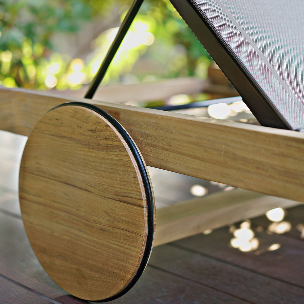 Ekka Teak Lounger by Mamagreen, showing clsoeup view of ekka teak lounger in live shot.