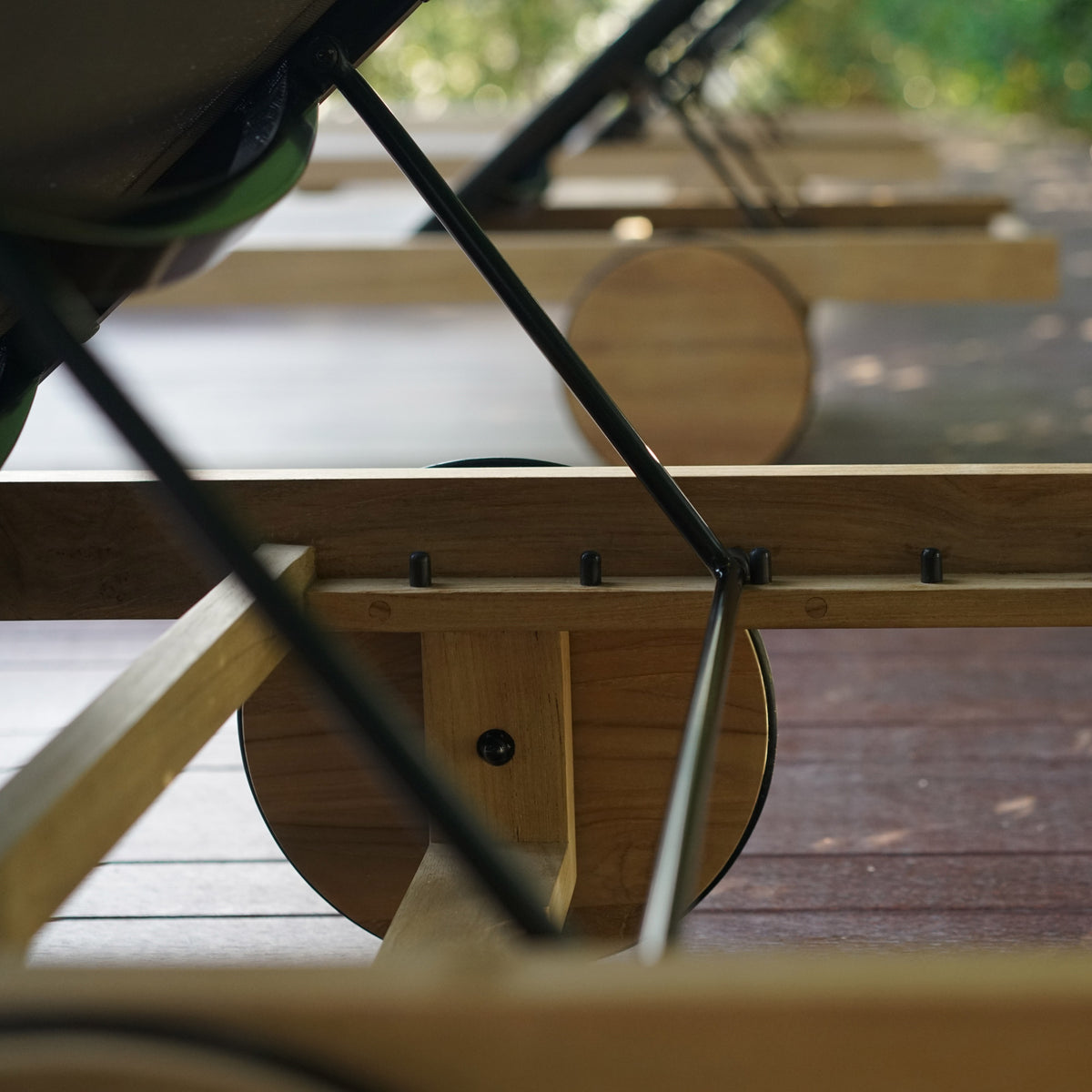 Ekka Teak Lounger by Mamagreen, showing clsoeup view of ekka teak lounger in live shot.