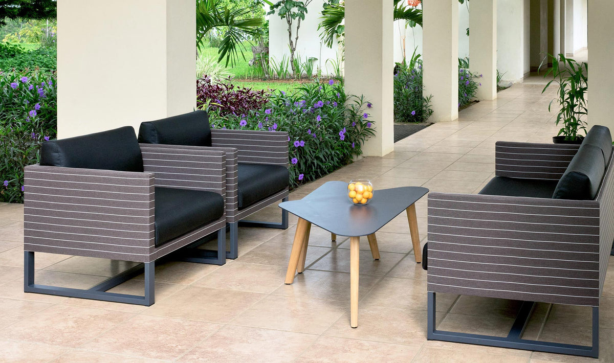 Kaat Teak Coffee Table by Mamagreen, showing kaat teak coffee table with mono 1-seater sofa and mono 2-seater sofa in live shot.