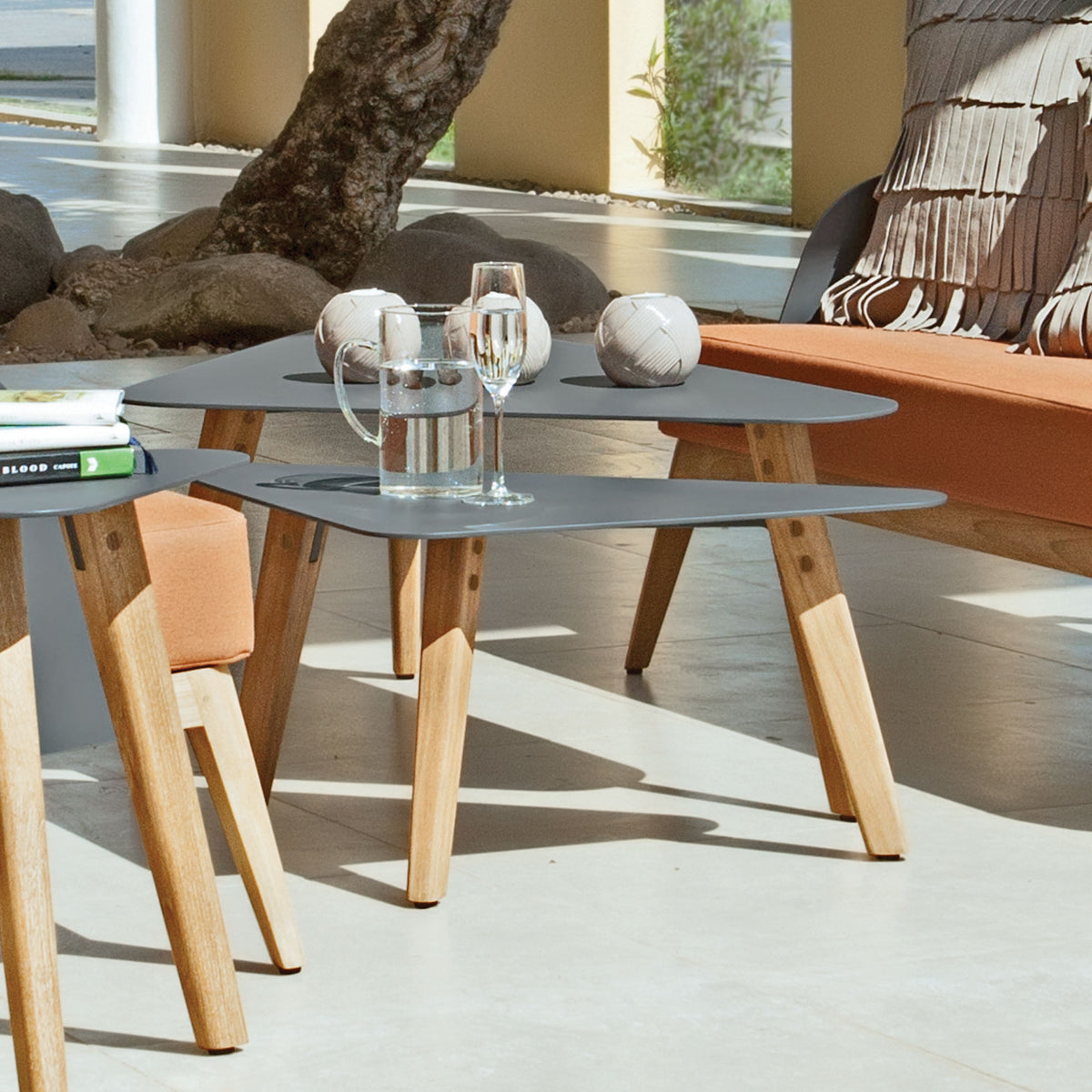 Kaat Teak Coffee Table by Mamagreen, showing closeup view of kaat teak coffee table in live shot.