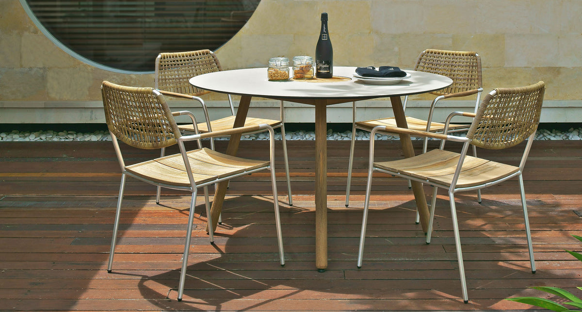 Meika Wicker Stacking Chair by Mamagreen, showing meika wicker stacking chairs in live shot.