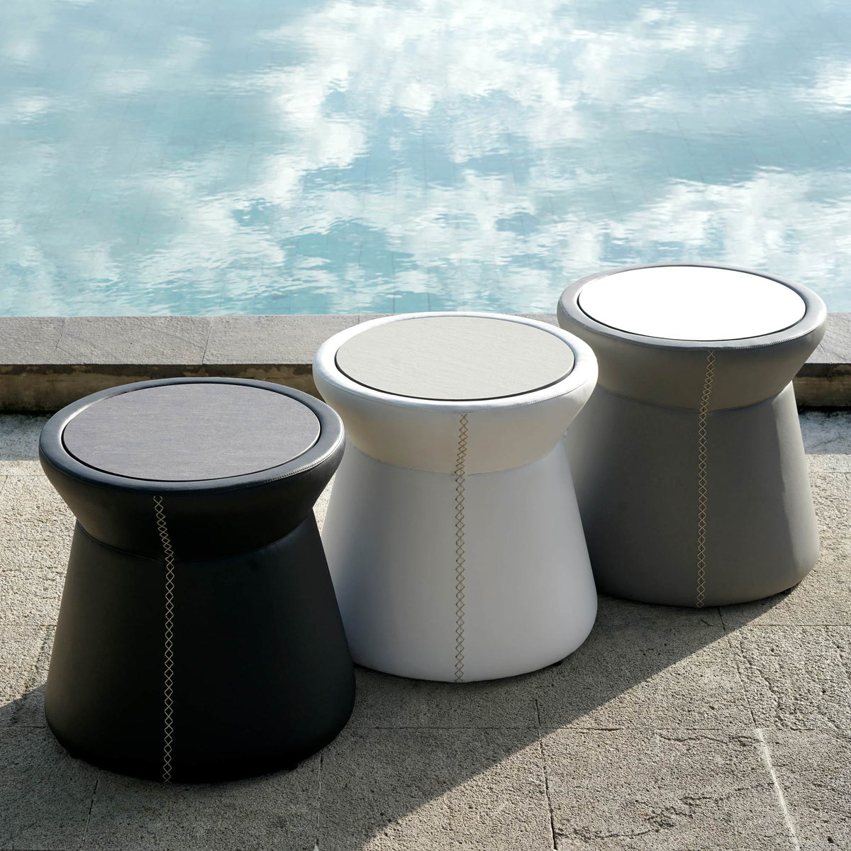 Stizzy HPL Side Table by Mamagreen, showing stizzy hpl side tables in live shot.