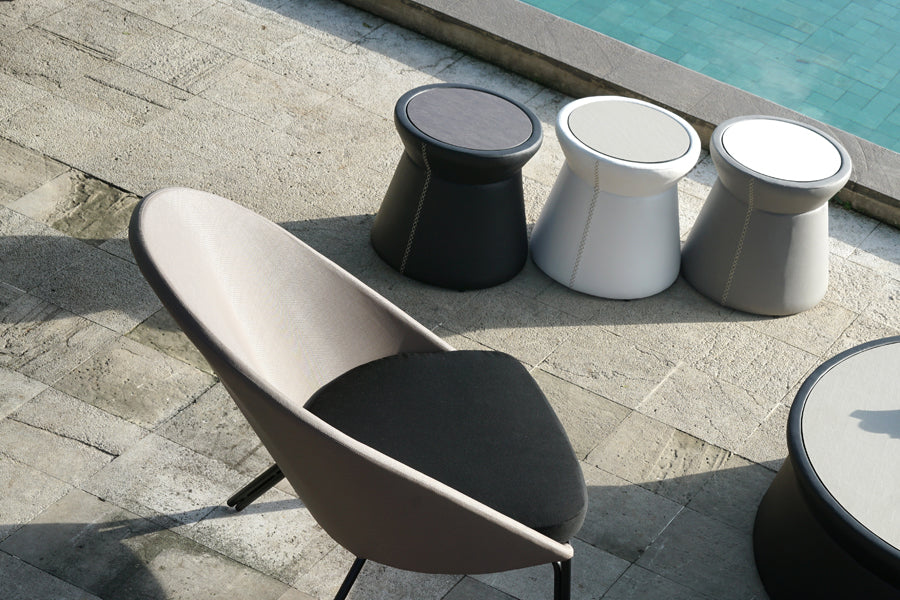 Stizzy HPL Side Table by Mamagreen, showing stizzy hpl side tables in live shot.