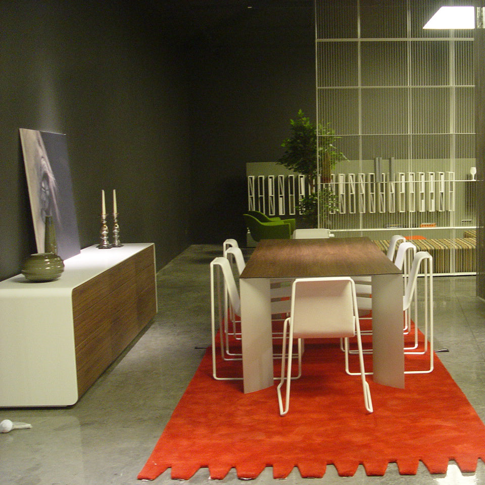 Manu Table by B&T, showing manu table with chairs in live shot.