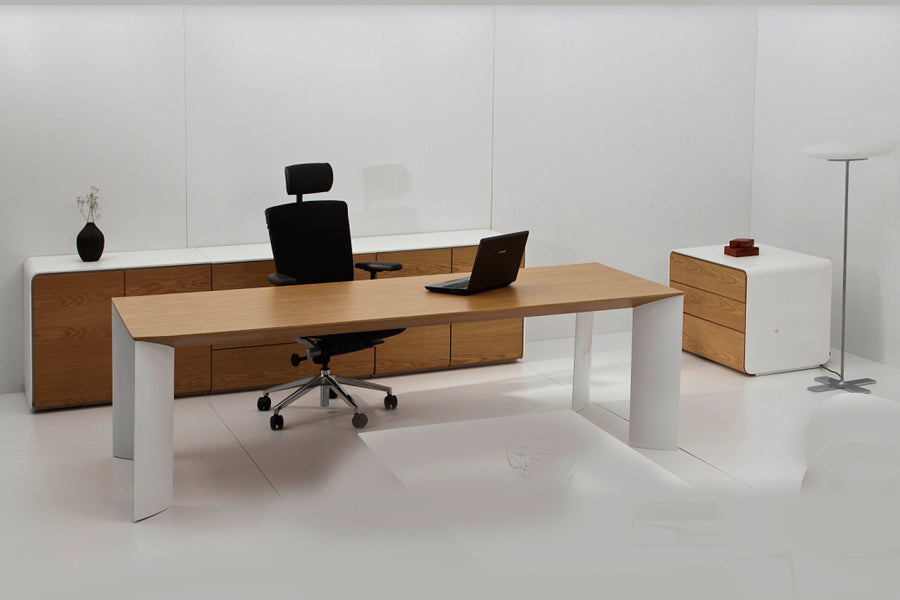 Manu Table by B&T, showing manu table with chair in live shot.