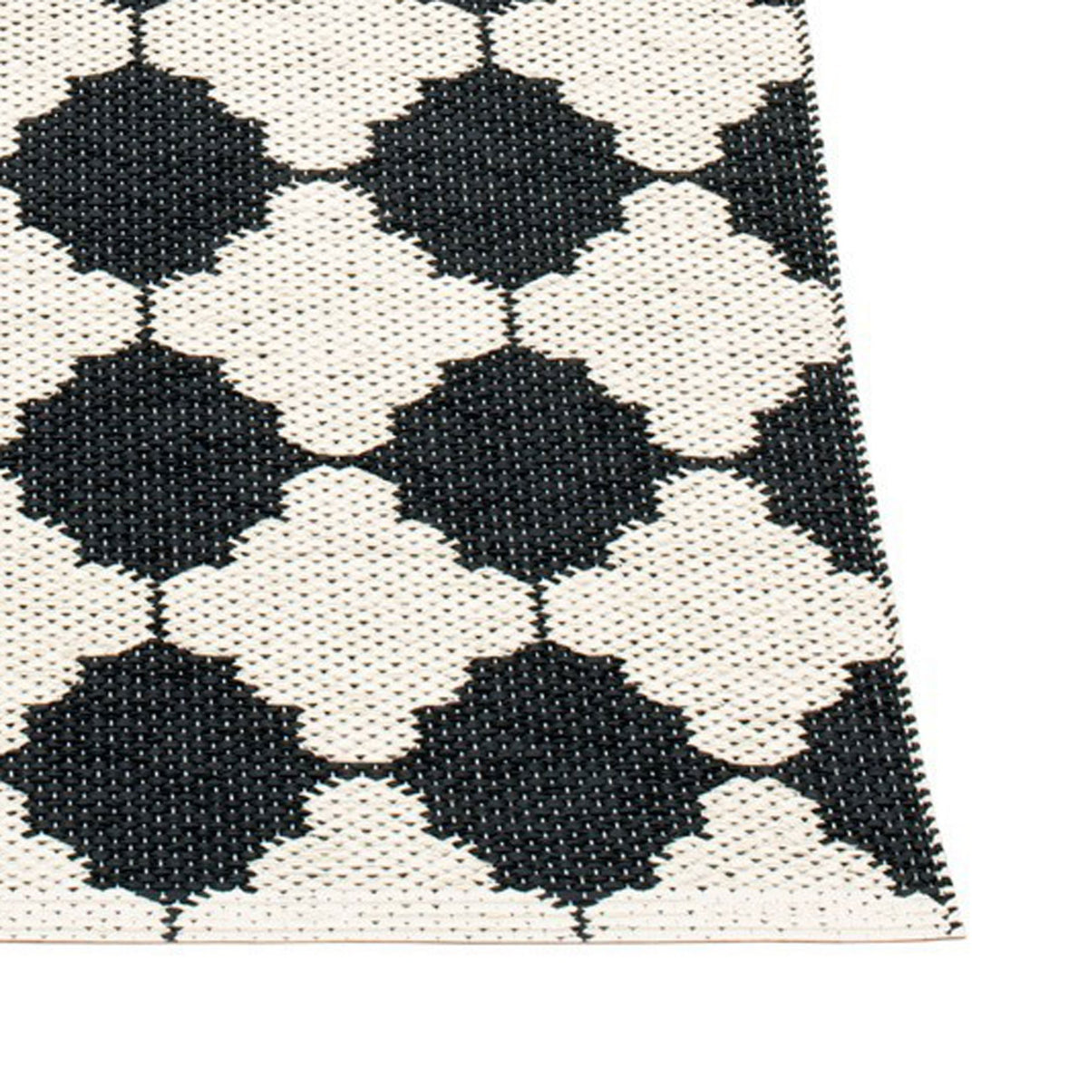 Marre Black & Vanilla with Coral Red Stripe Runner Rug by Pappelina, showing closeup view of marre black & vanilla with coral red stripe runner rug.