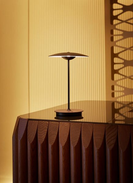 Ginger Portable Table Lamp by Marset, showing ginger portable table lamp in live shot.