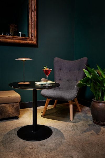 Ginger Portable Table Lamp by Marset, showing ginger portable table lamp in live shot.