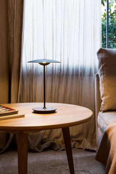 Ginger Portable Table Lamp by Marset, showing ginger portable table lamp in live shot.