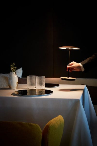 Ginger Portable Table Lamp by Marset, showing ginger portable table lamp in live shot.