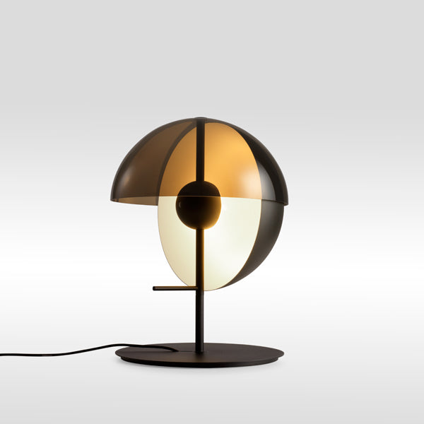 Theia Table Lamp by Marset, showing angle view of black table lamp.