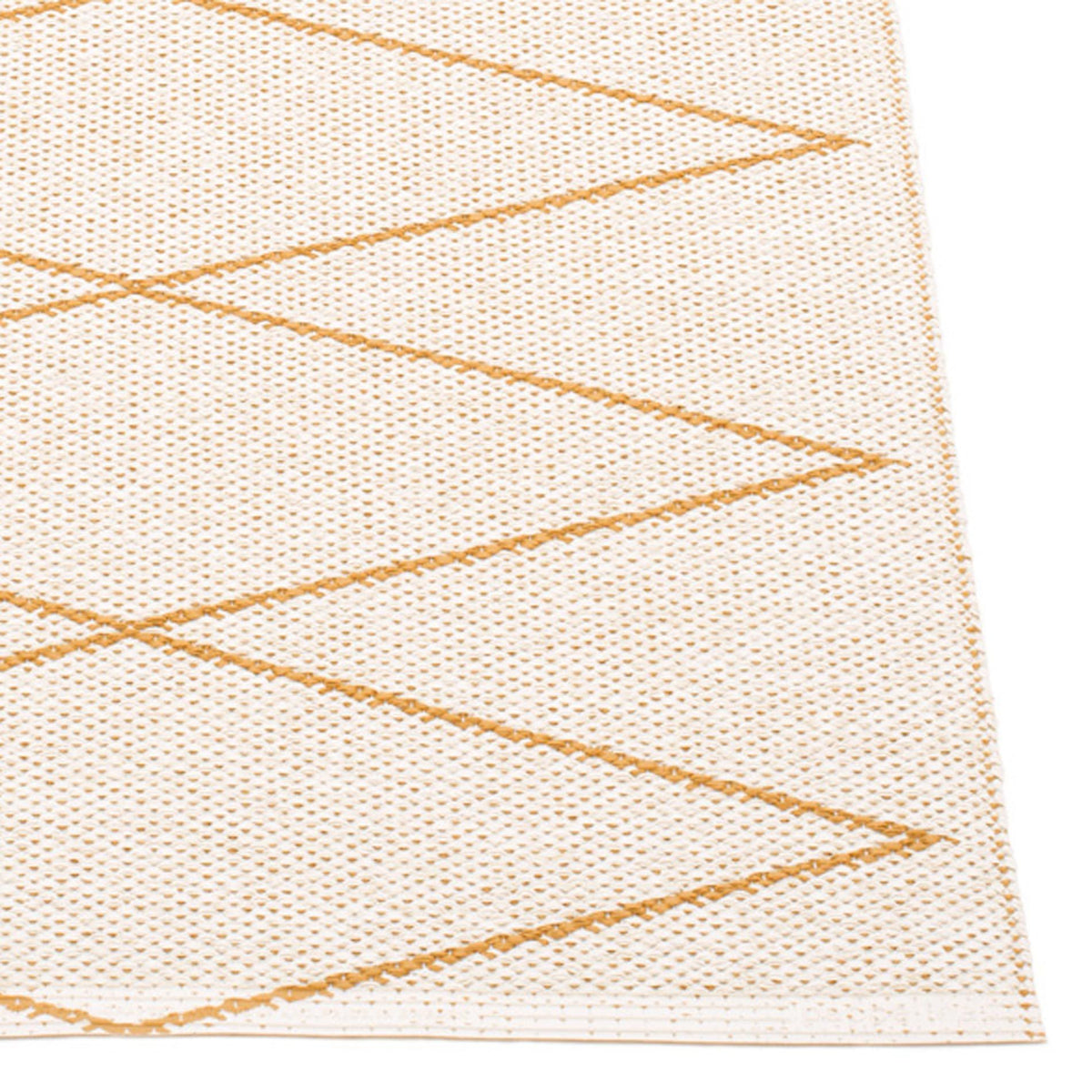 Max Ochre Runner Rug by Pappelina, showing closeup view of max ochre runner rug.