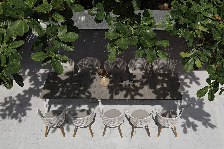 Maxximus HPL Extension Dining Table by Mamagreen, showing maxximus hpl extension dining table in live shot.