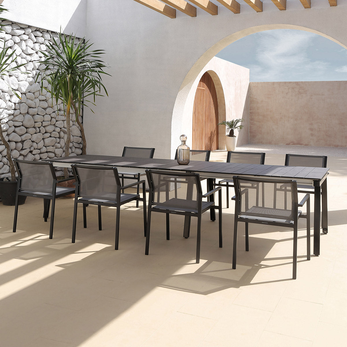 Maxximus HPL Extension Dining Table by Mamagreen, showing maxximus hpl extension dining table in live shot.