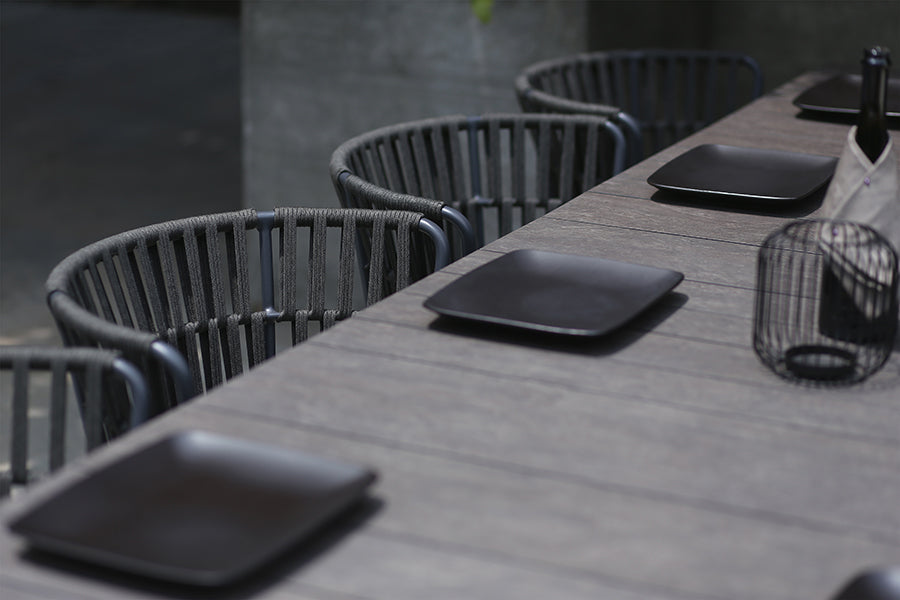 Maxximus HPL Extension Dining Table by Mamagreen, showing closeup view of maxximus hpl extension dining table in live shot.