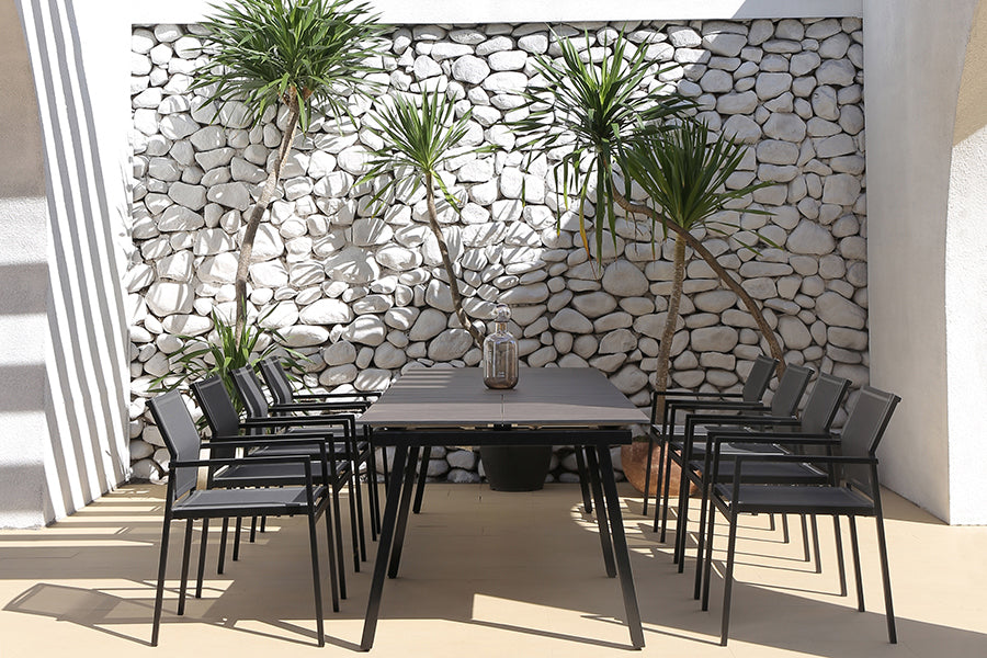 Maxximus HPL Extension Dining Table by Mamagreen, showing maxximus hpl extension dining table in live shot.