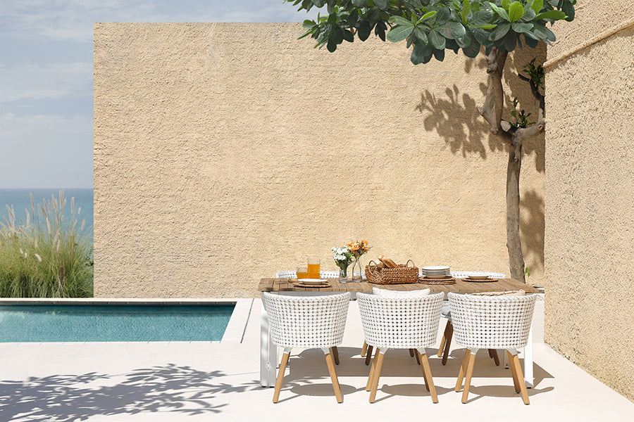 Maxximus Teak Extension Dining Table by Mamagreen, showing maxximus teak extension dining table in live shot.