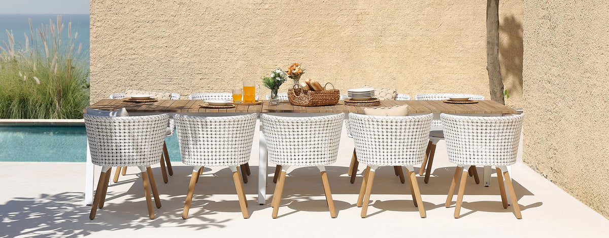 Maxximus Teak Extension Dining Table by Mamagreen, showing maxximus teak extension dining table in live shot.