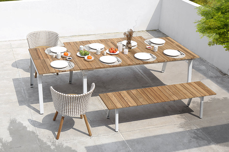 Maxximus Teak Extension Dining Table by Mamagreen, showing maxximus teak extension dining table in live shot.