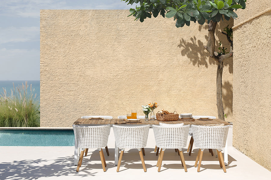 Maxximus Teak Extension Dining Table by Mamagreen, showing maxximus teak extension dining table in live shot.