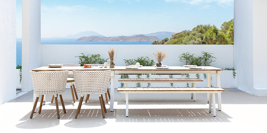 Maxximus Teak Extension Dining Table by Mamagreen, showing maxximus teak extension dining table in live shot.