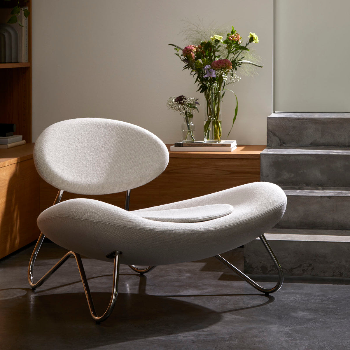 Meadow Lounge Chair by Woud, showing meadow lounge chair in live shot.