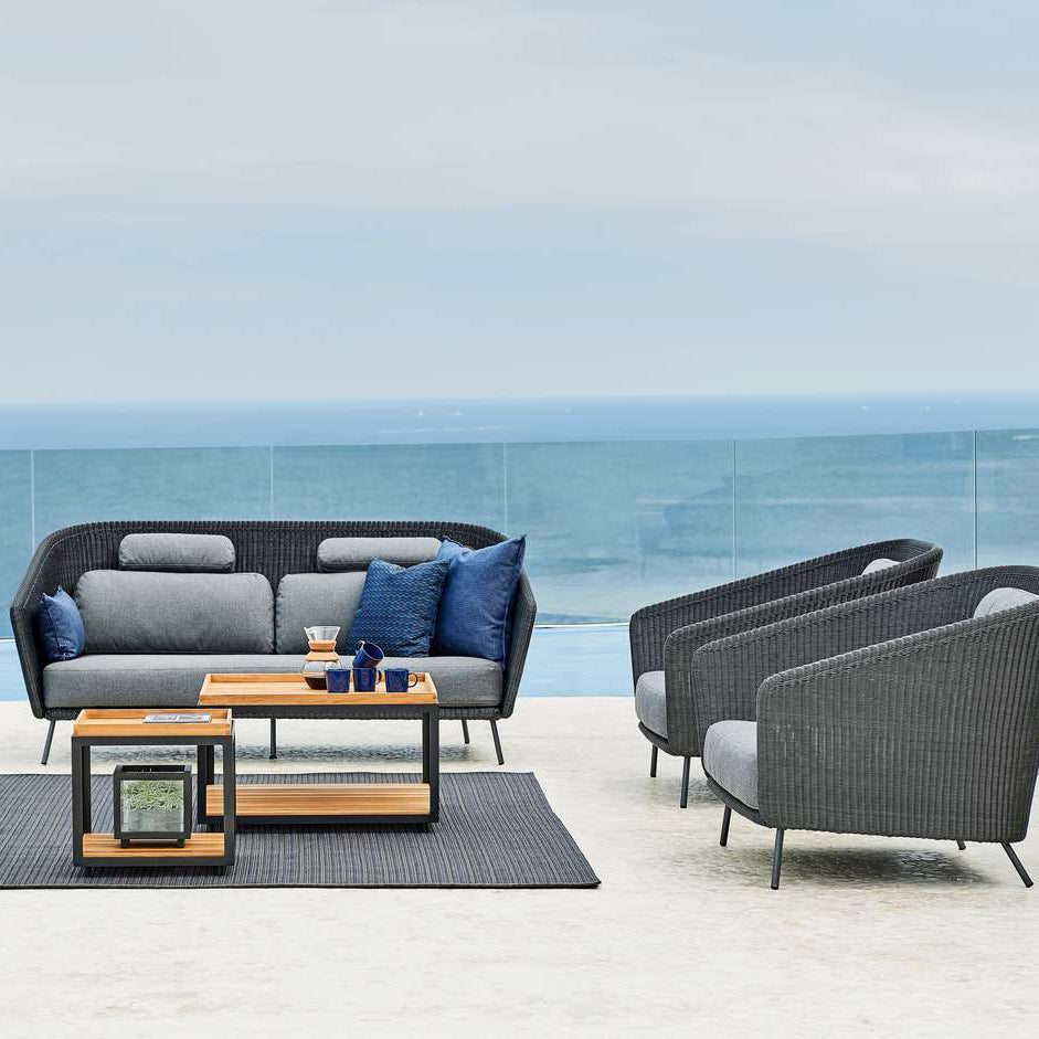 Mega 2 Seater Sofa by Cane-Line, showing mega 2 seater sofa in live shot.