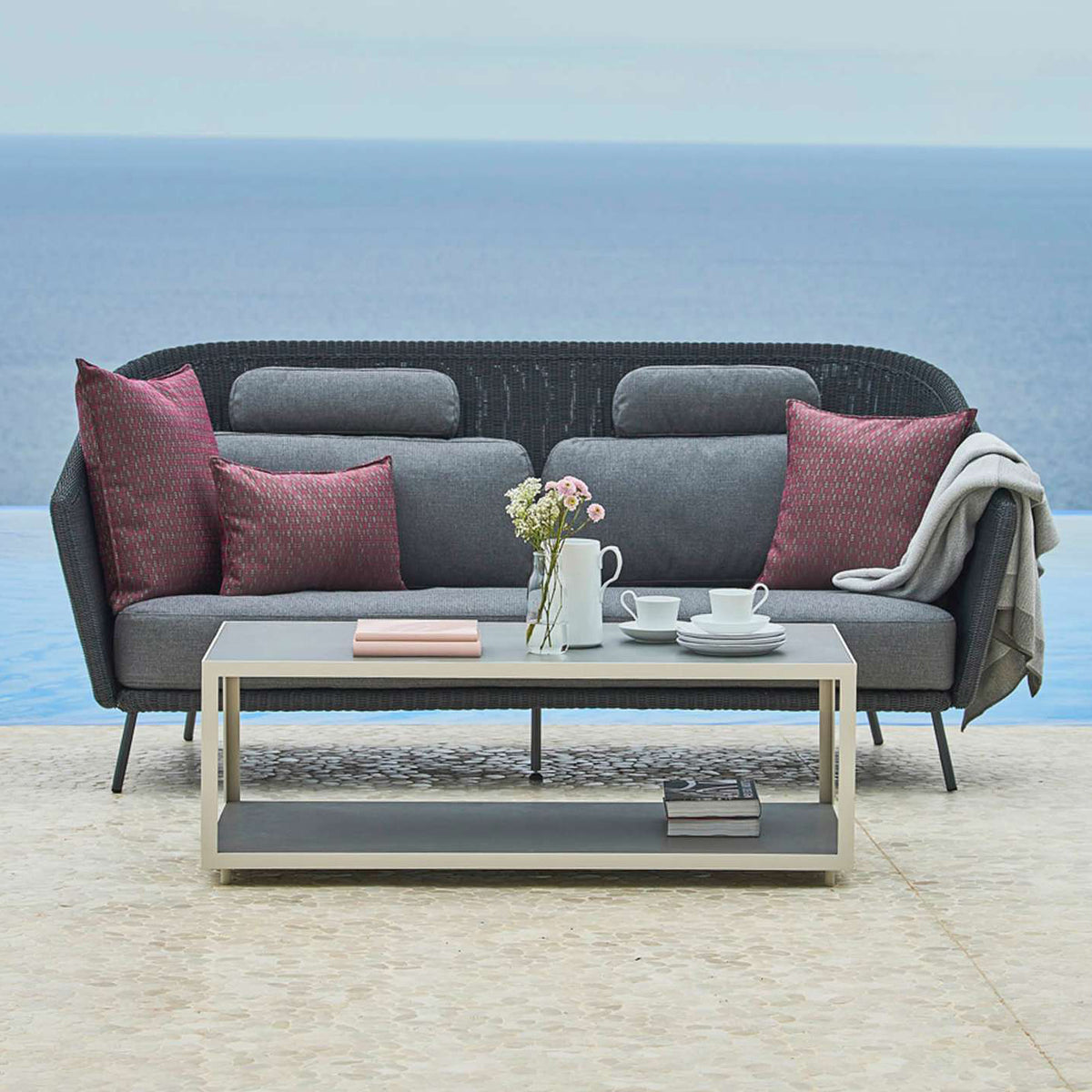Mega 2 Seater Sofa by Cane-Line, showing mega 2 seater sofa in live shot.
