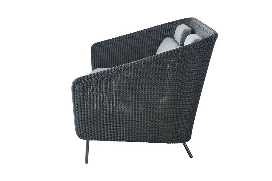 Mega 2 Seater Sofa by Cane-Line, showing side view of mega 2 seater sofa in graphite weave/grey cushions.