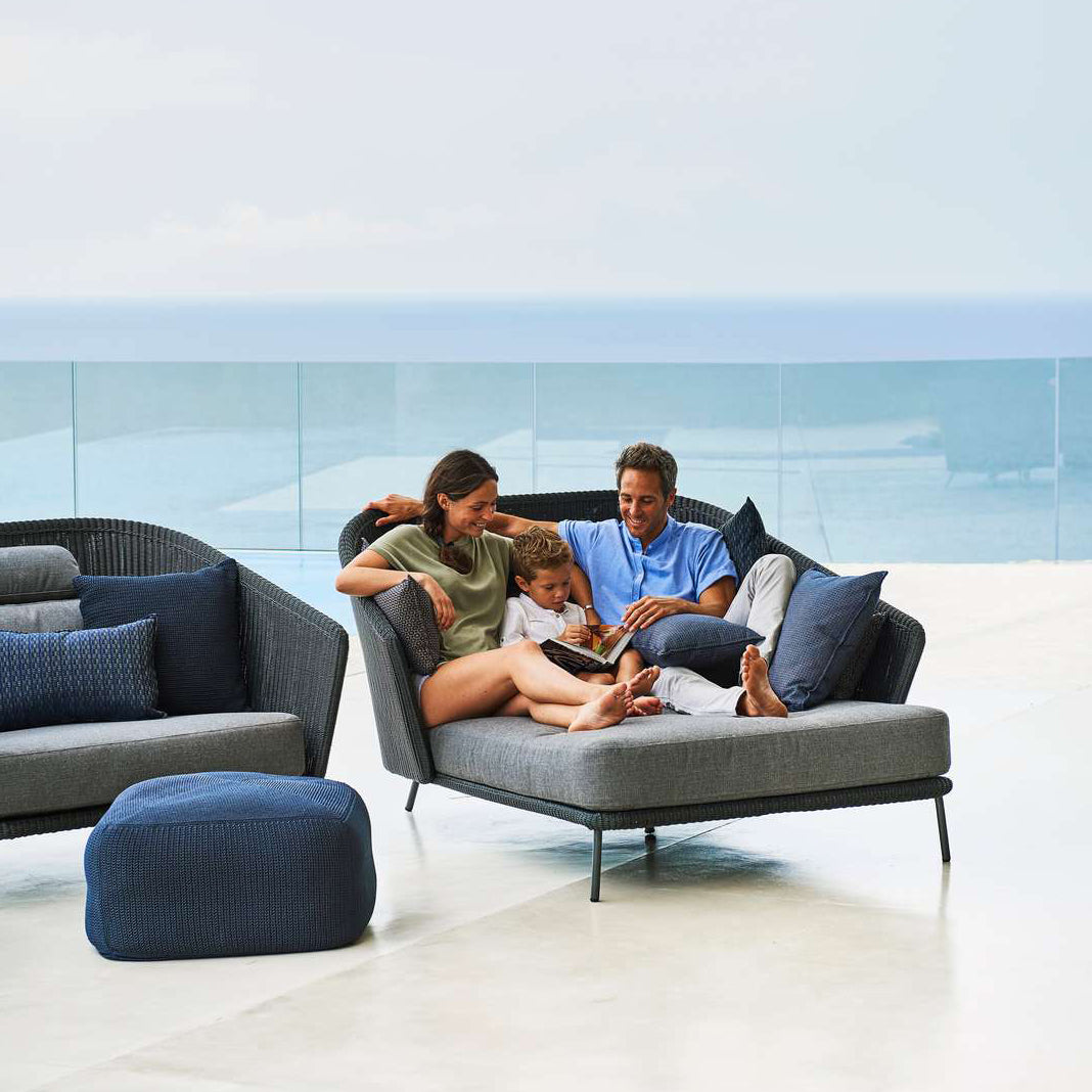 Mega Daybed by Cane-Line, showing mega daybed in live shot.