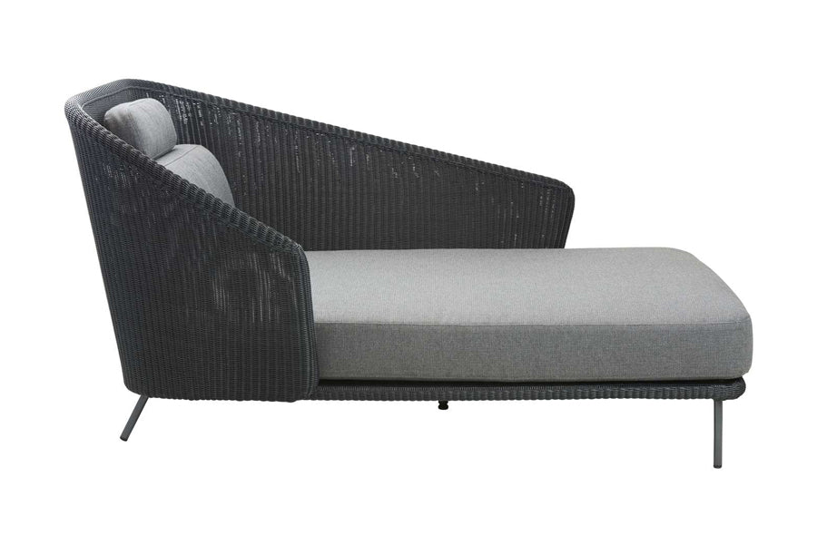 Mega Daybed by Cane-Line, showing side view of mega daybed in left hand/graphite weave/grey cushions.