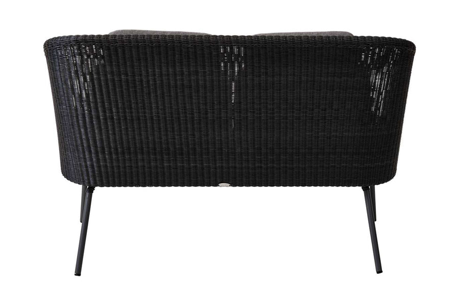Mega Dining Bench by Cane-Line, showing back view of mega dining bench in grey weave/grey cushions.