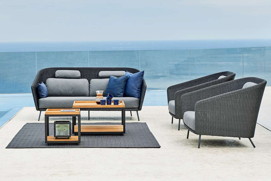Mega Lounge Chair by Cane-Line, showing mega lounge chairs in live shot.