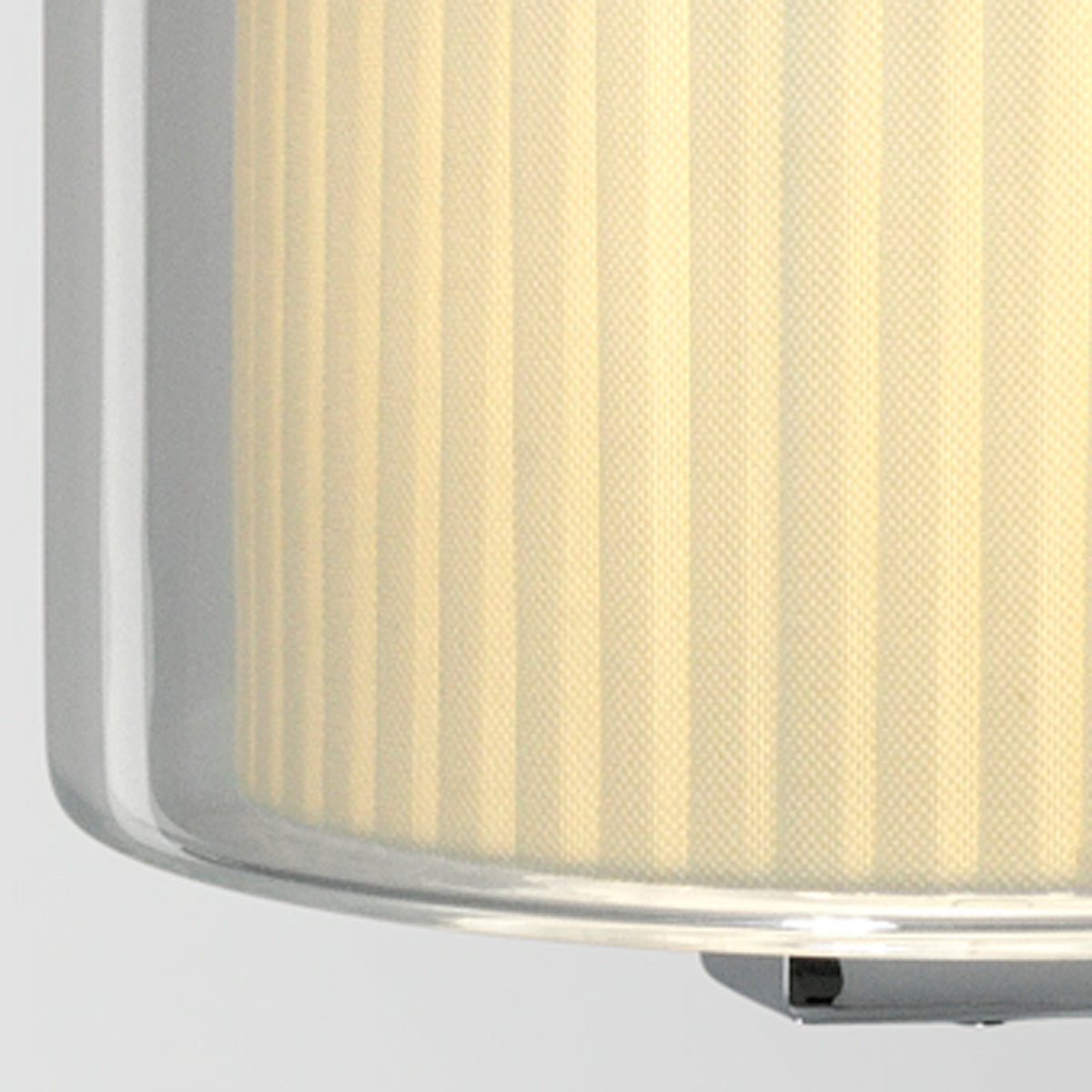 Mercer A Wall Lamp by Marset, showing closeup view of mercer a wall lamp in pleated white cotton shade.