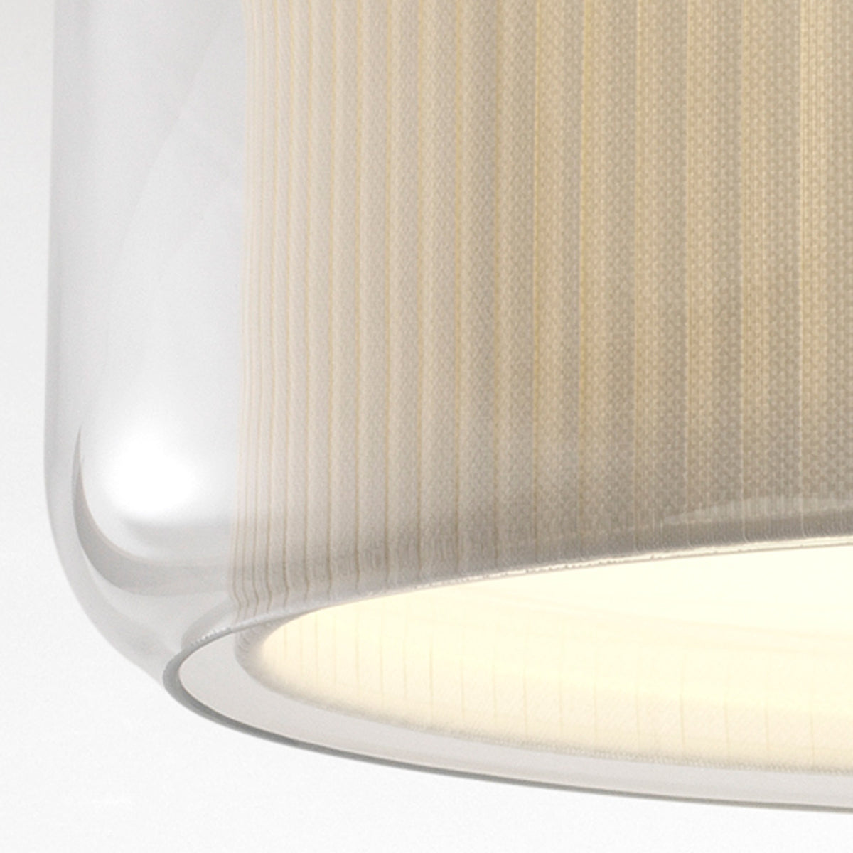 Mercer C Ceiling Lamp by Marset, showing closeup view of mercer c ceiling lamp in pleated white cotton shade.