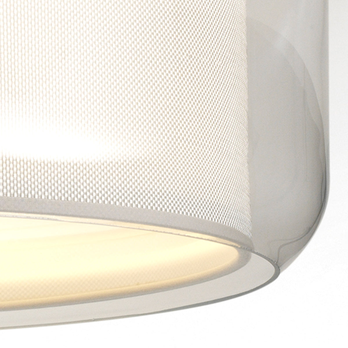 Mercer C Ceiling Lamp by Marset, showing closeup view of mercer c ceiling lamp in pearl white shade.