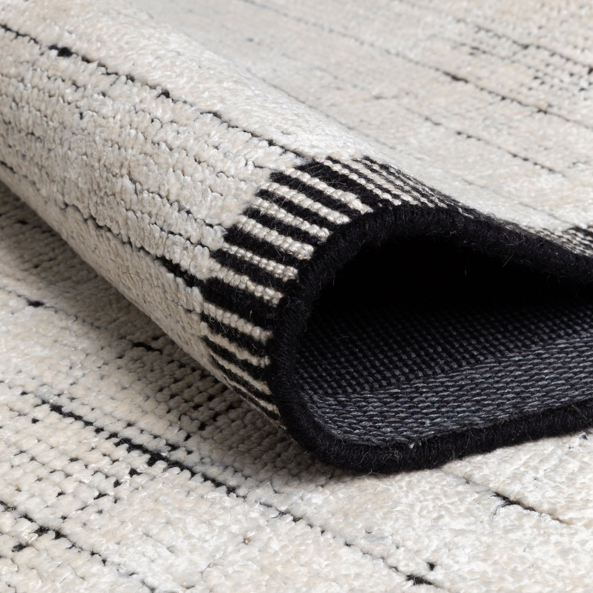 Mesh Hand Woven Double Backing Rug by Ligne Pure, showing closeup view of mesh hand woven double backing rug.