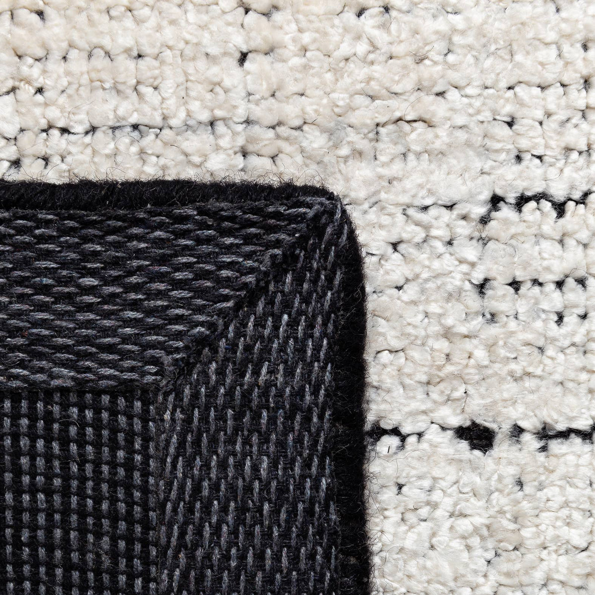 Mesh Hand Woven Double Backing Rug by Ligne Pure, showing closeup view of mesh hand woven double backing rug.