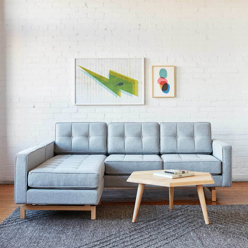 Metric Coffee Table by Gus Modern, showing metric coffee table with sectional live shot.