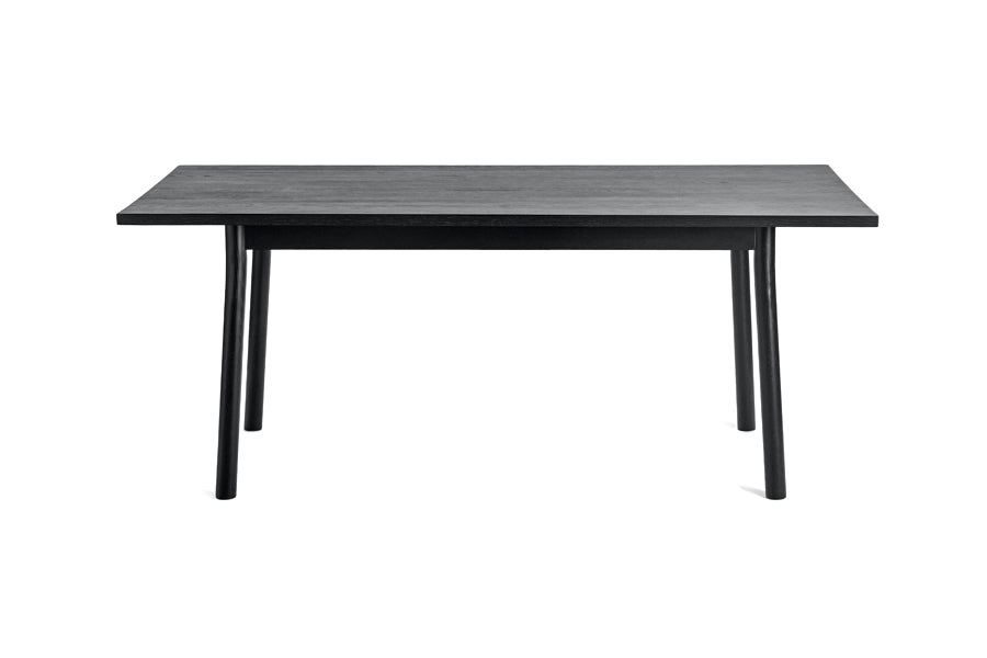 Mia Dining Table by Kollektiff, showing front view of mia dining table in black ash frame with black ash veneer MDF top.