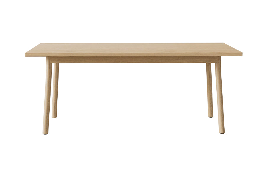 Mia Dining Table by Kollektiff, showing front view of mia dining table in natural oak.