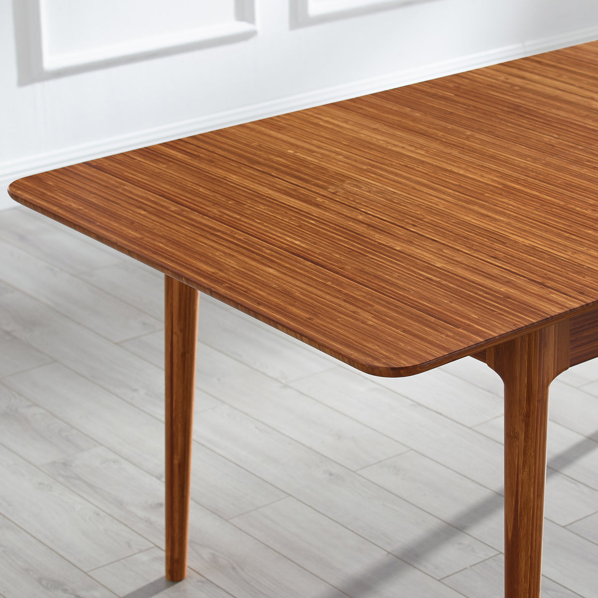 Mija Extensible Dining Table by Greenington, showing closeup view of mija extensible dining table in live shot.