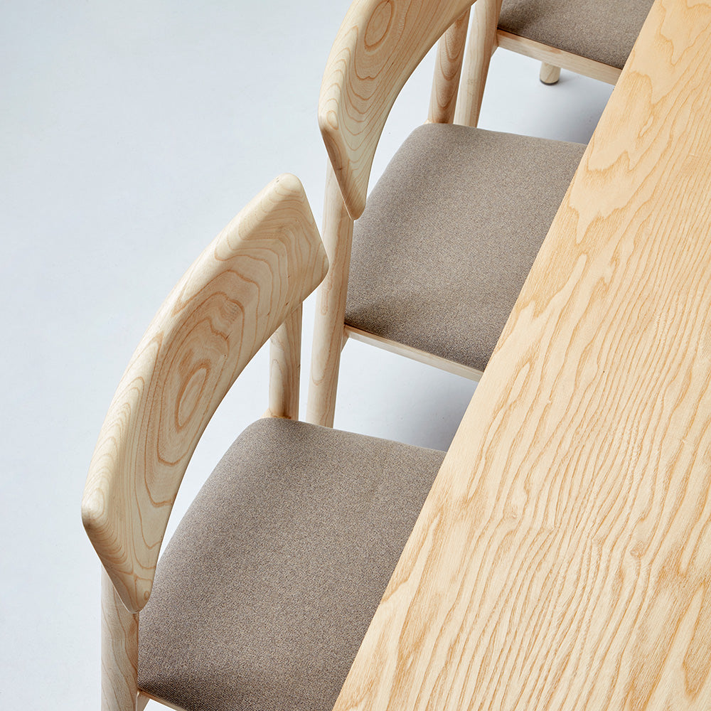 Mika Chair by B&T, showing mika chairs in live shot.