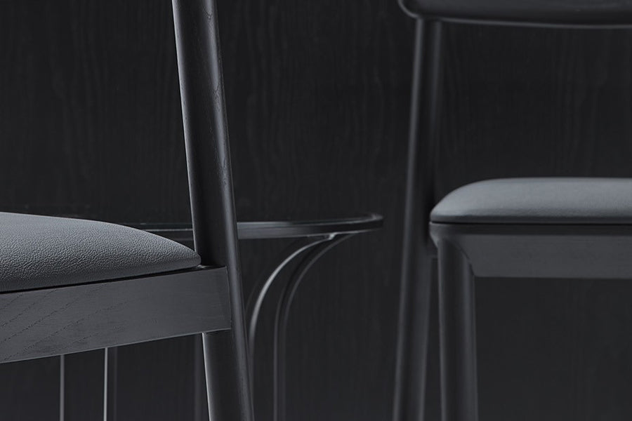 Mika Stool by B&T, showing closeup view of mika stools in live shot.