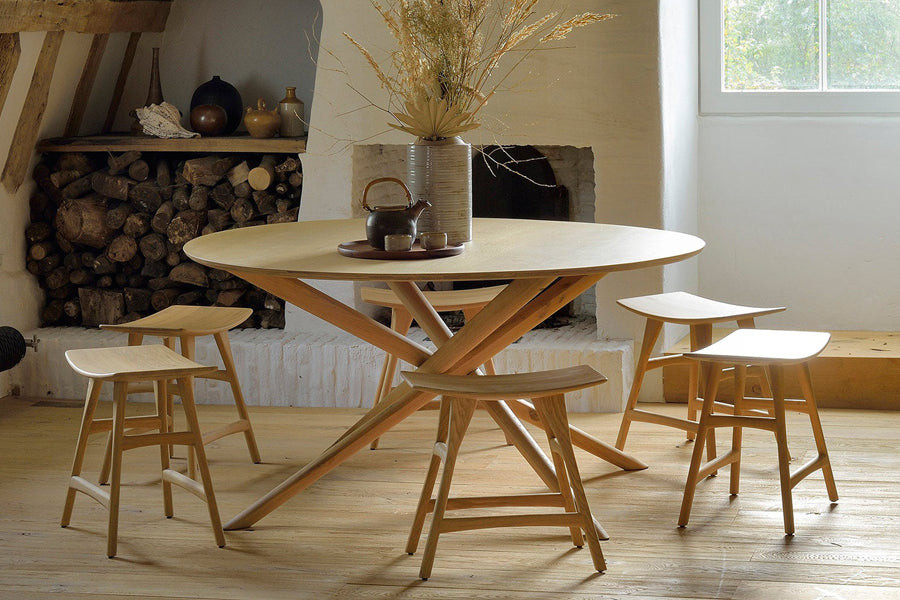 Mikado Dining Table by Ethnicraft, showing mikado dining table in live shot.
