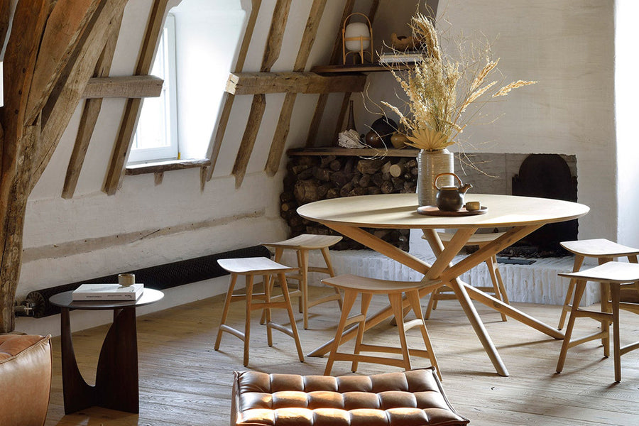 Mikado Dining Table by Ethnicraft, showing mikado oak dining table in live shot.