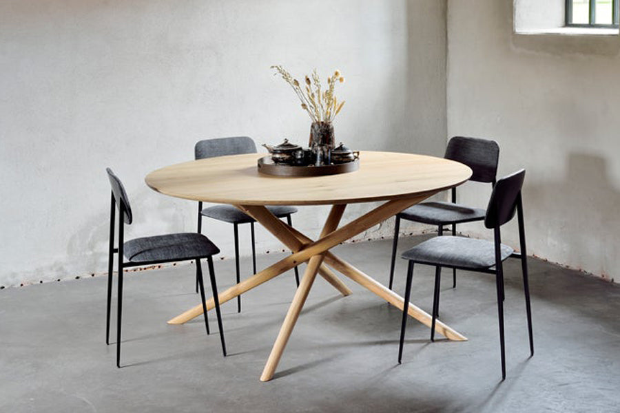 Mikado Dining Table by Ethnicraft, showing mikado dining table in live shot.