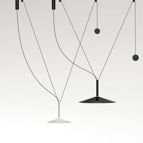 Milana Counterweight Dimmable Pendant by Marset, showing milana counterweight dimmable pendants in live shot.