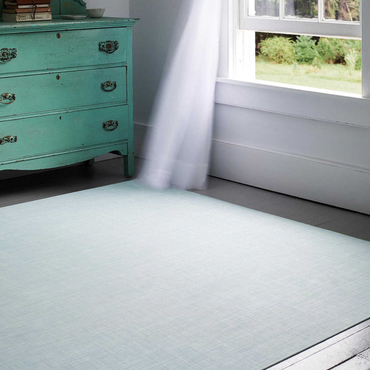 Mini Basketweave Woven Floor Mat by Chilewich, showing mini basketweave woven floor mat in live shot.